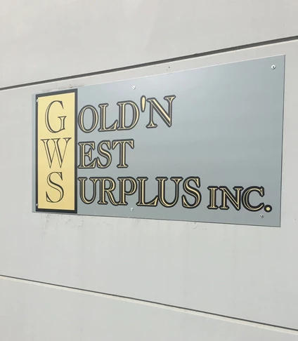 Exterior building signage for Goldn West Surplus Inc
