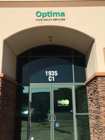 Exterior building sign & vinyl window decal for Optima Health Services  